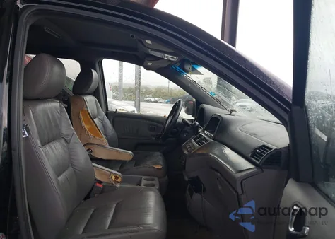 2010 Honda Odyssey Touring z USA, uszkodzony, nr VIN 5FNRL3H97AB039089